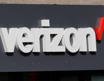A Verizon sign is displayed on a store, Sept. 30, 2025, in Cambridge, Mass