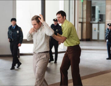 Bill Skarsgård and Dacre Montgomery in Dead Man's Wire