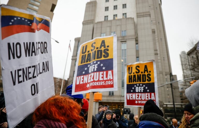 People protest outside Manhattan Federal Court before the arraignment of Venezuelan President Nicolas Maduro, Monday, Jan. 5, 2026, in New York. (AP Photo/Stefan Jeremiah)