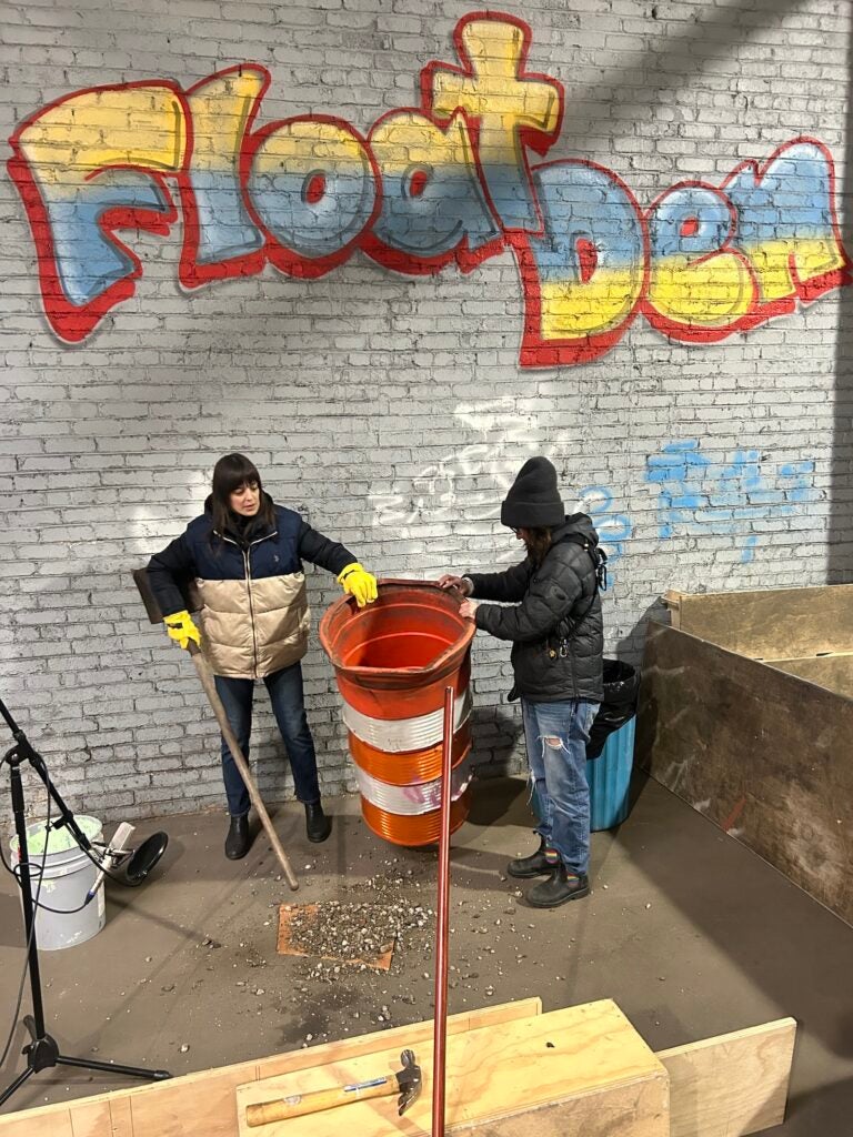 Sweeping up shattered glass while recording noises