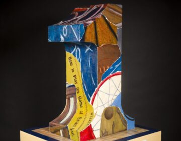 firstival-basketball-bp-2026-01-22 A hand carved artistic numeral 1 sculpture