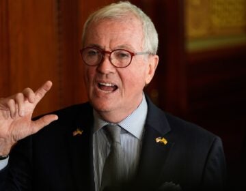 Phil Murphy expressively speaking during a press conference