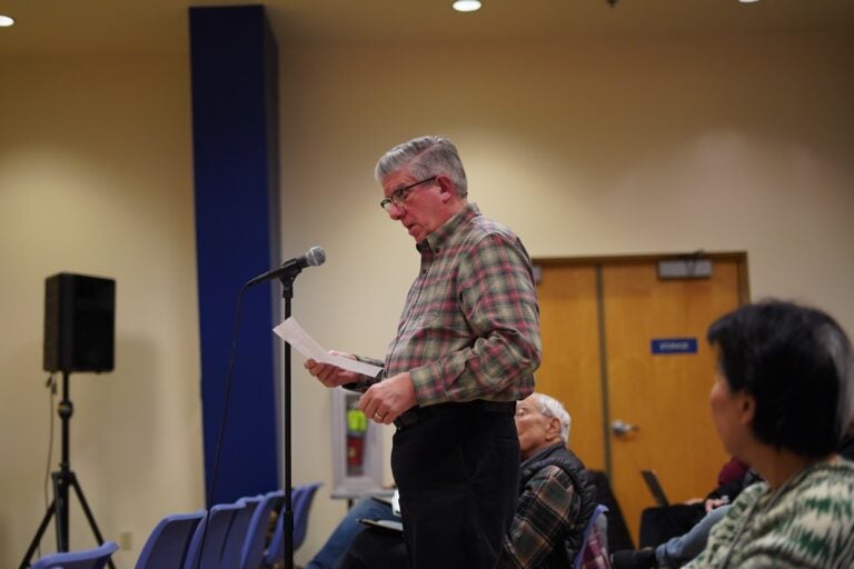 An audience member speaks as Democratic hopefuls Tracy Hunt, Lucia Simonelli and Rob Strickler hold a town hall in Horsham