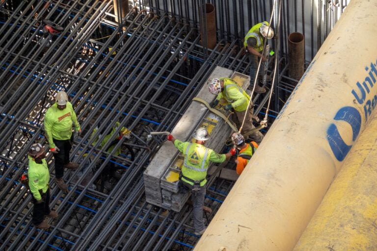 Construction workers working on the Hudson River rail tunnel project