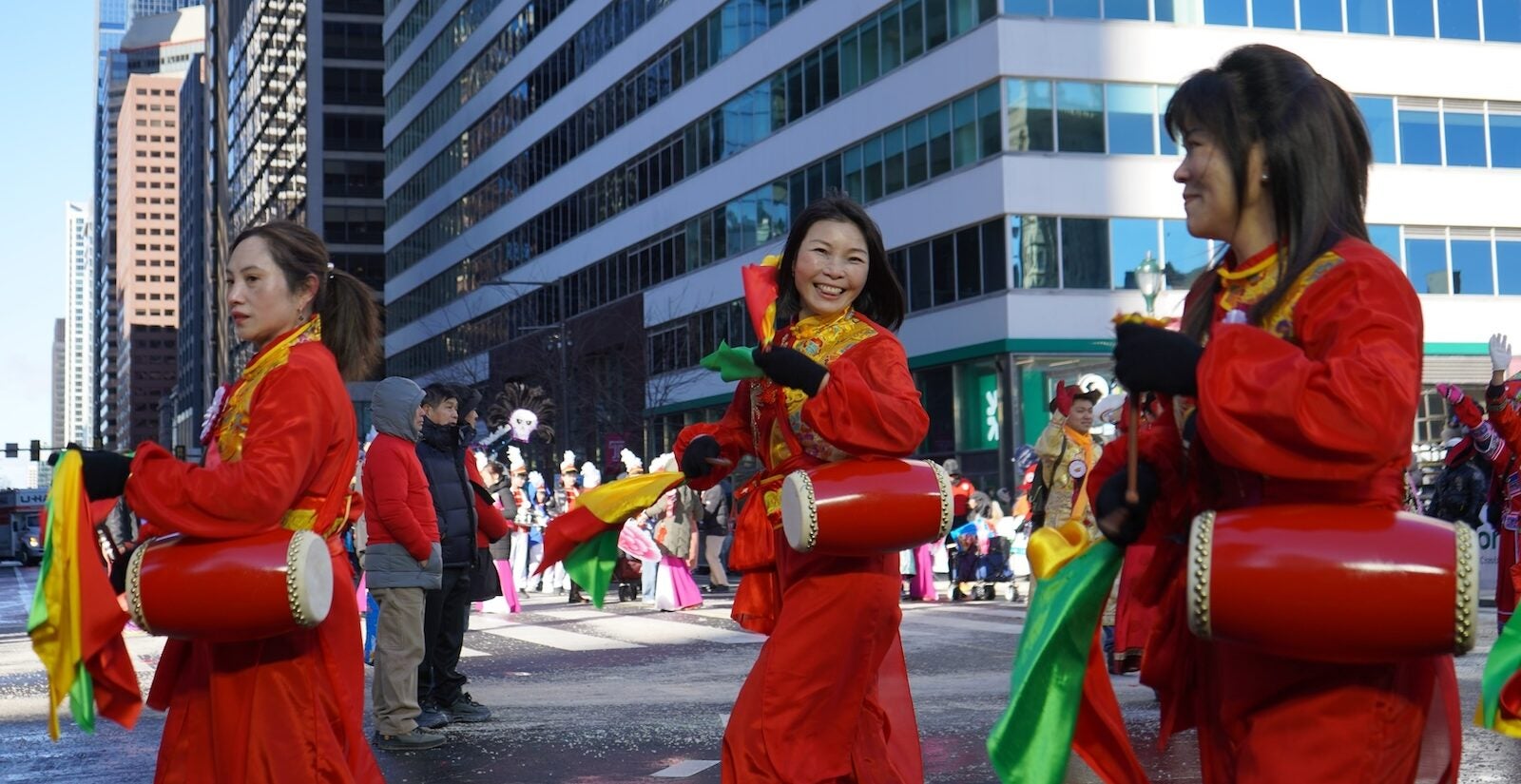 Drummers from the Philadelphia Chinese Community Organizations United finish their Mummer's parade performance in front of City Hall.