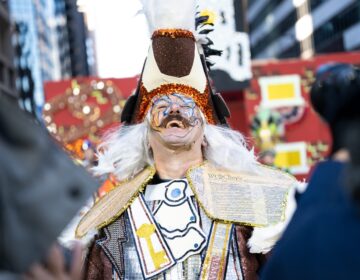 mummers-philadelphia-bp-010626 A patriotic mummer wearing copies of the Constitution performs