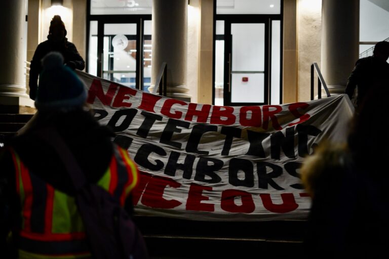 Advocates and community members hold a vigil outside of Norristown Municipal Hall condemning ICE's actions in Montgomery County.