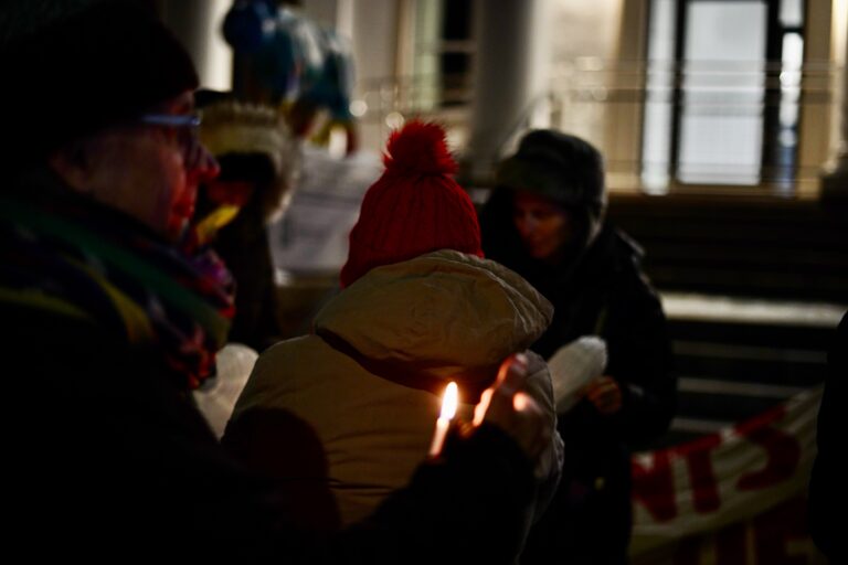 Advocates and community members hold a vigil outside of Norristown Municipal Hall condemning ICE's actions in Montgomery County.