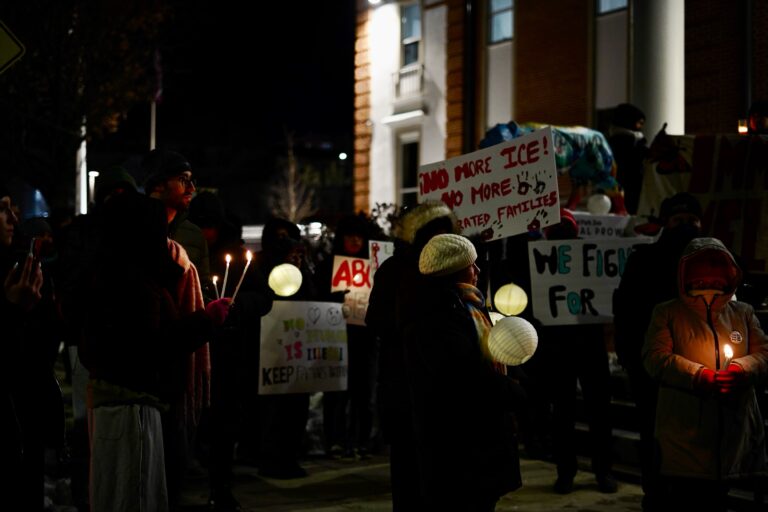 Advocates and community members hold a vigil outside of Norristown Municipal Hall condemning ICE's actions in Montgomery County.