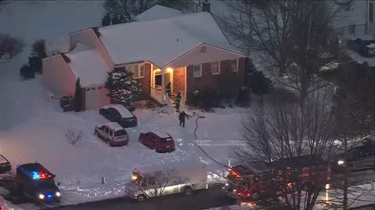 Police on the scene after three bodies