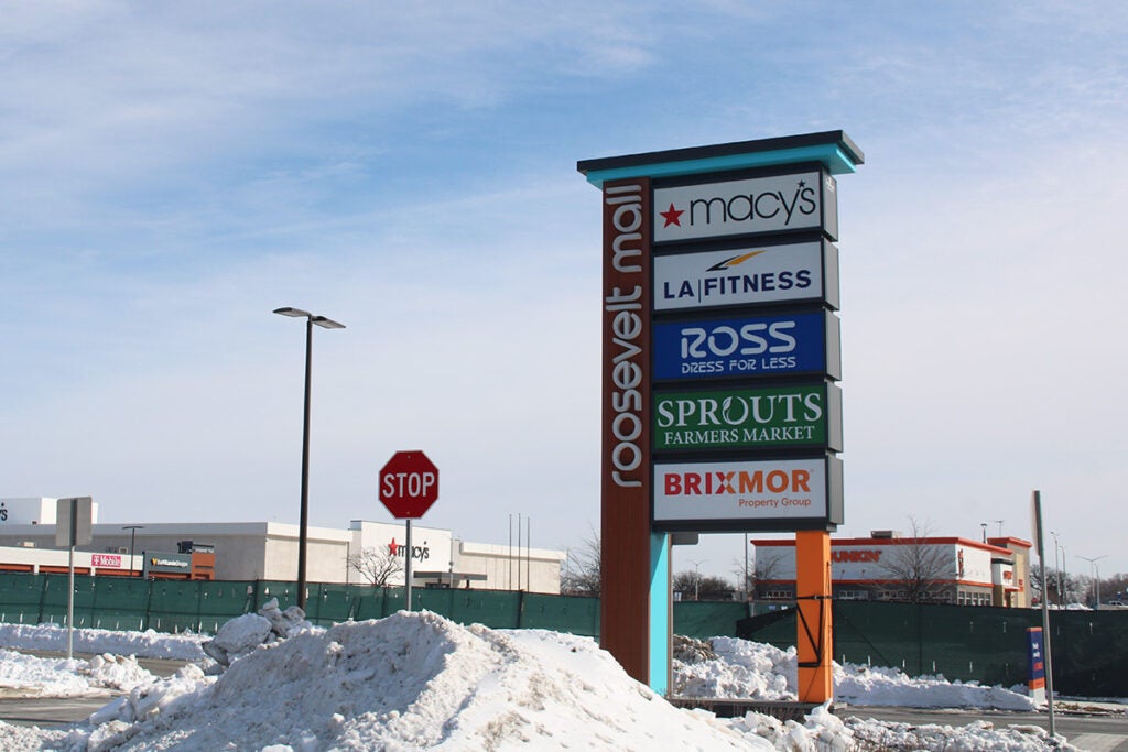 Signs of businesses inside a strip mall in Philadelphia