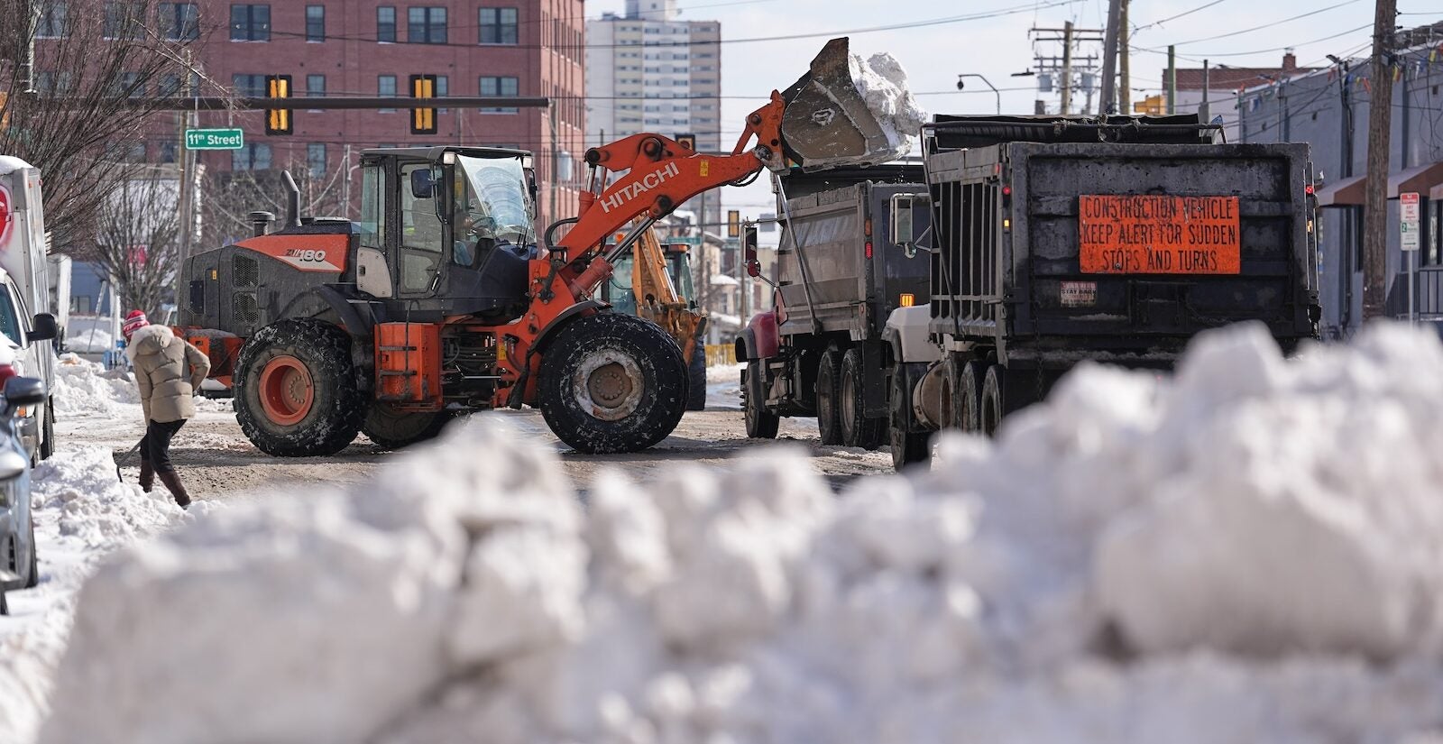 Snow is removed in the aftermath of a winter storm in Philadelphia, Monday, Jan. 26, 2026