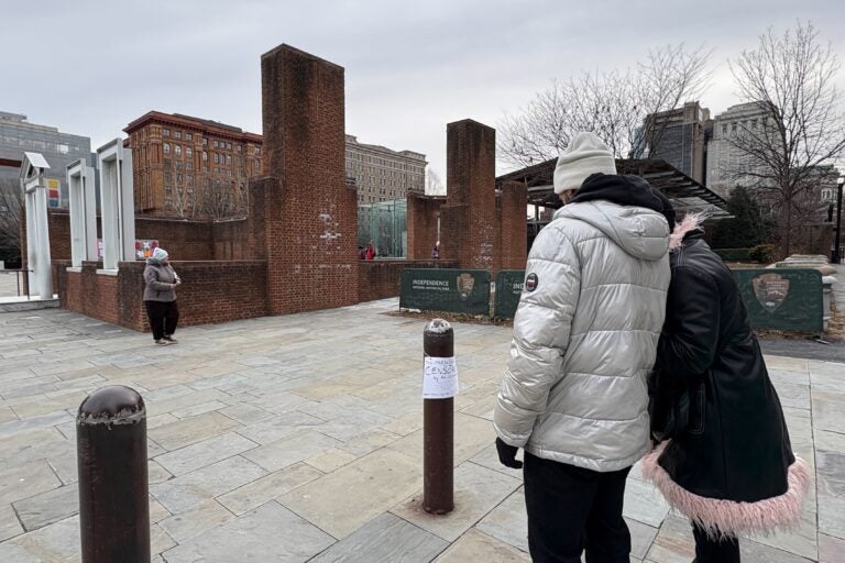 Handwritten signs reading 