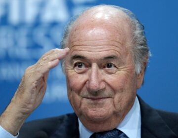 Sepp Blatter gestures during a press conference