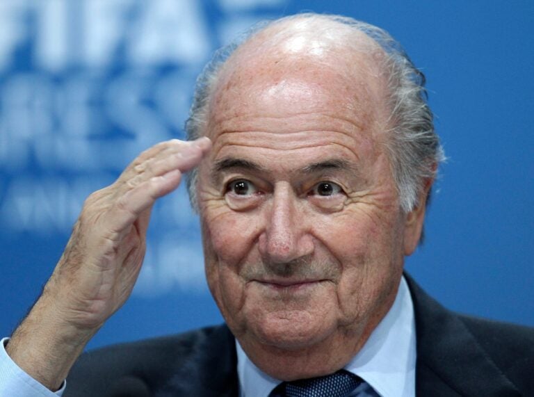 Sepp Blatter gestures during a press conference