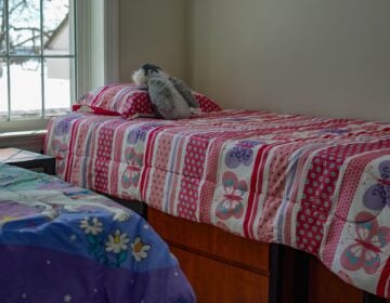 west-chester-shelter-k-cooper-2026-01-21-2 A room with 2 beds by the window in the shelter.