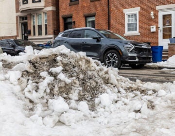 A pile of snow sits on the side of a road in Philadelphia