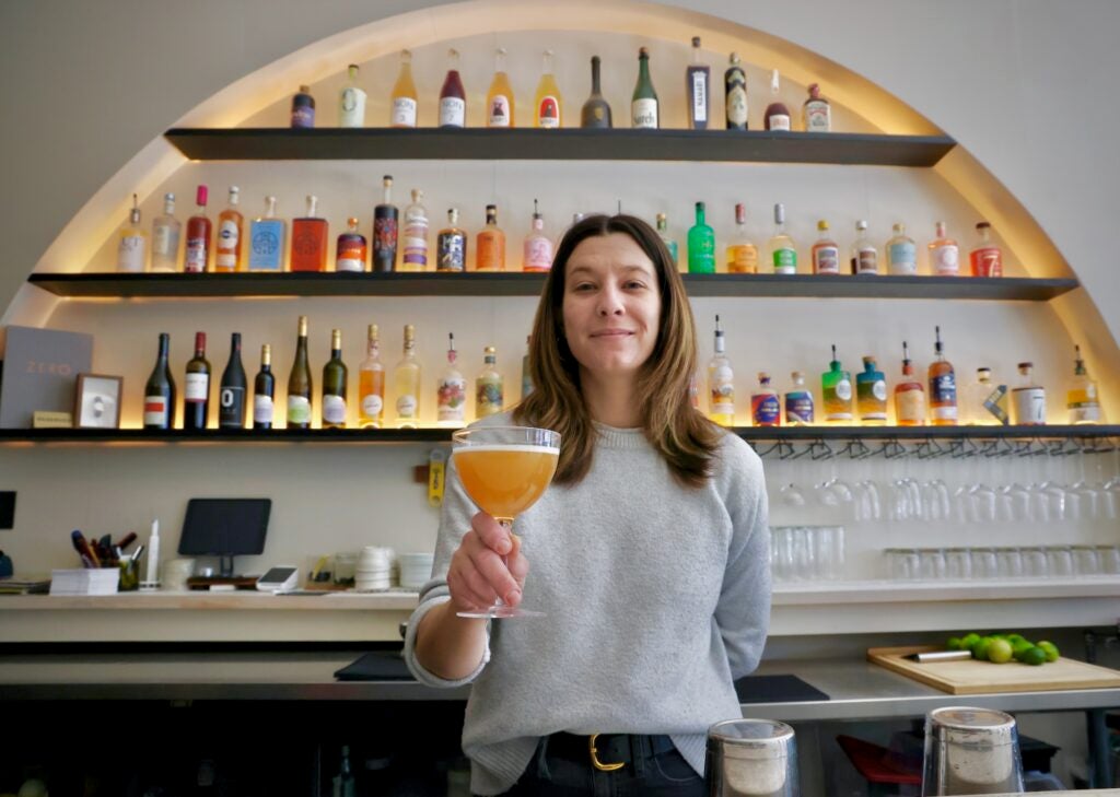 Nikki Graziano, proprietor of Bar Palmina in Fishtown, serves up a nonalcoholic French Blonde. (Emma Lee/WHYY)