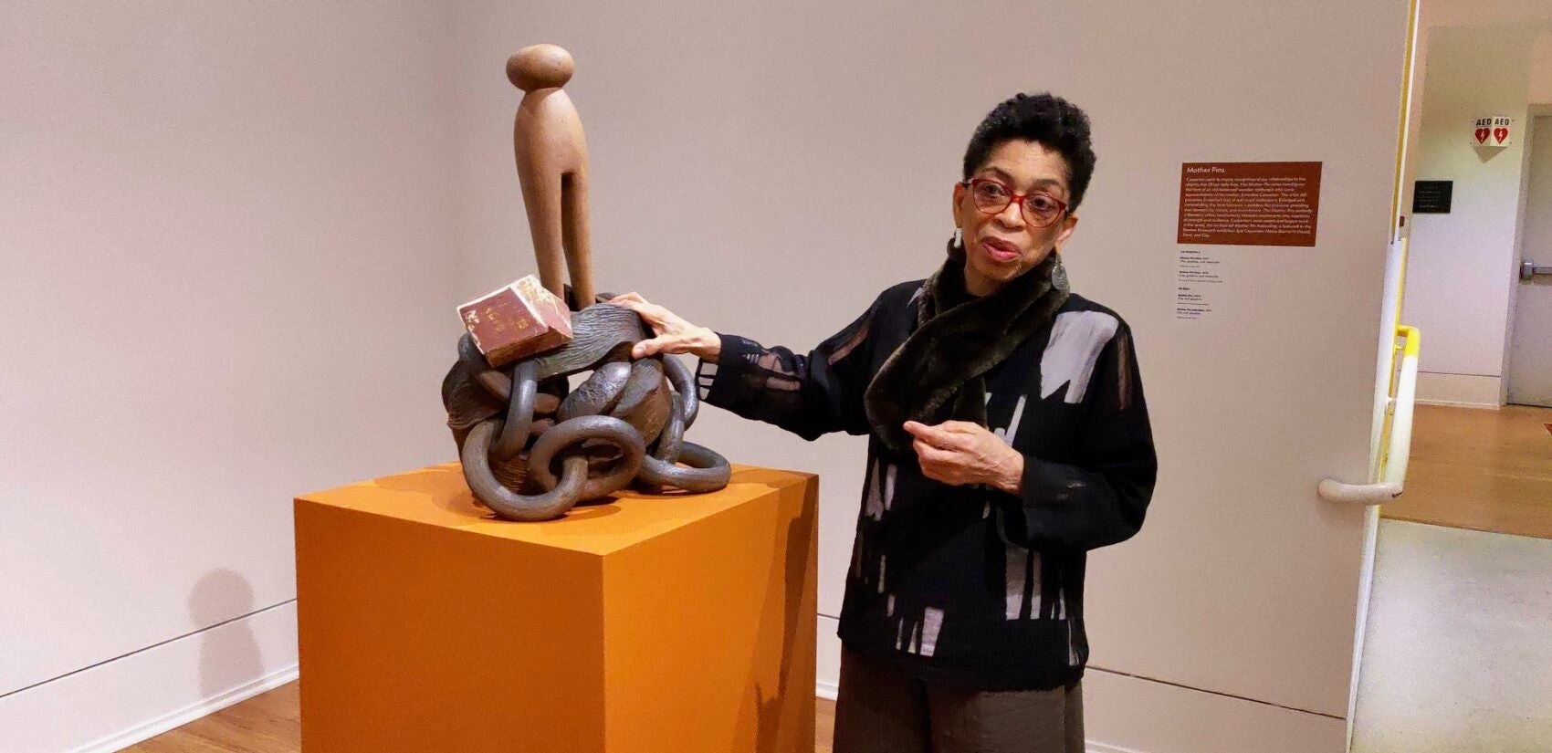 Syd Carpenter looks on