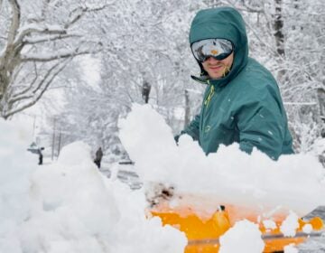 Jake Brickle shoveling his driveway in Moorestown, New Jersey, after a huge snowstorm in Moorestown, New Jersey