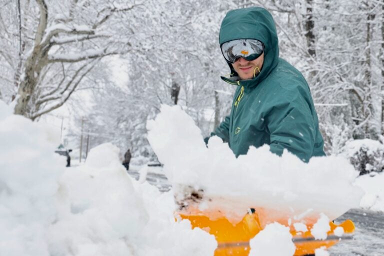Jake Brickle shoveling his driveway in Moorestown, New Jersey, after a huge snowstorm on Feb. 23, 2026