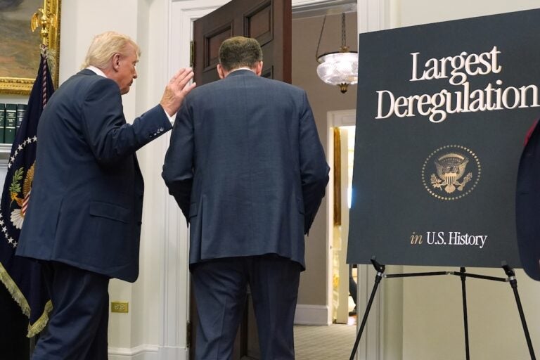 President Donald Trump departs with Environmental Protection Agency director Lee Zeldin and Office of Management after announcing the EPA will no longer regulate greenhouse gases, in the Roosevelt Room of the White House, Thursday, Feb. 12, 2026, in Washington. (AP Photo/Evan Vucci)