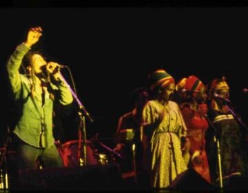 Bob Marley singing on stage