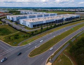 A large industrial complex near a suburban area