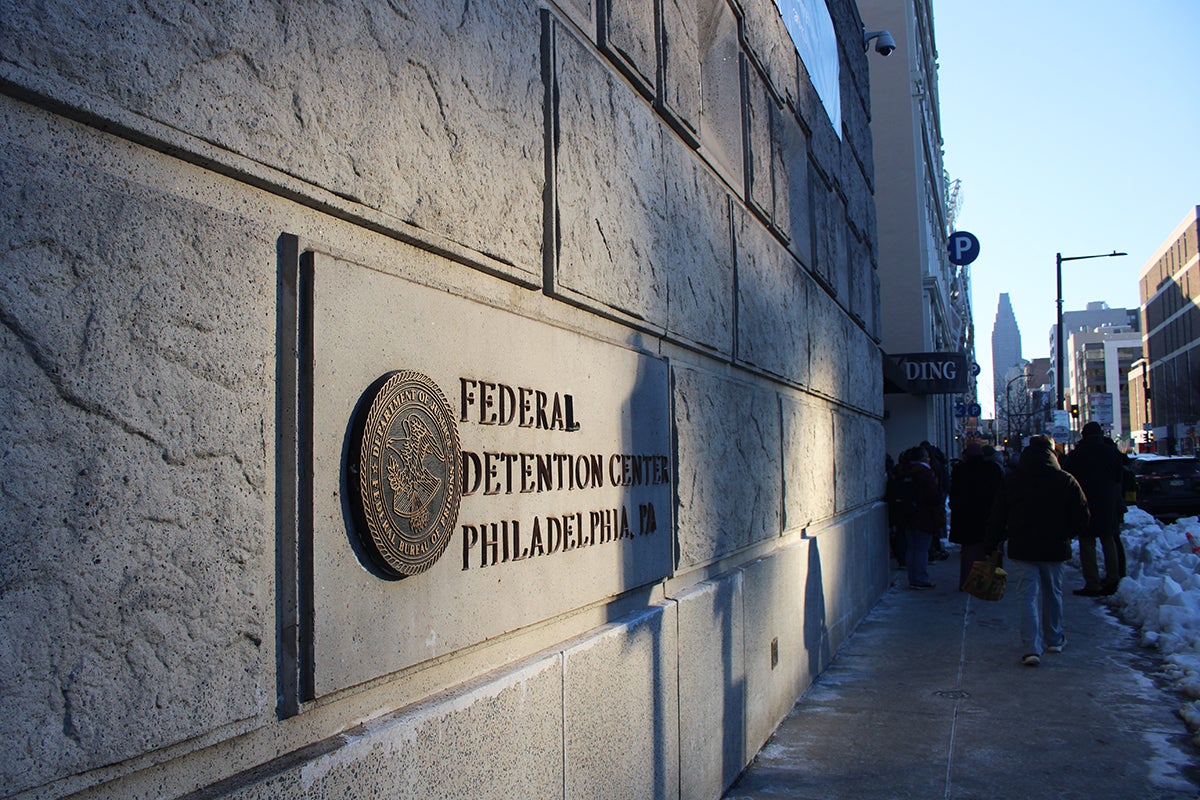 The sign on the exterior of the building at the Federal Detention Center