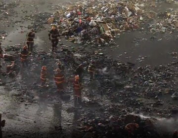 Firefighters at the scene of a fire