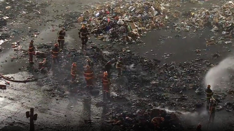 Firefighters at the scene of a fire