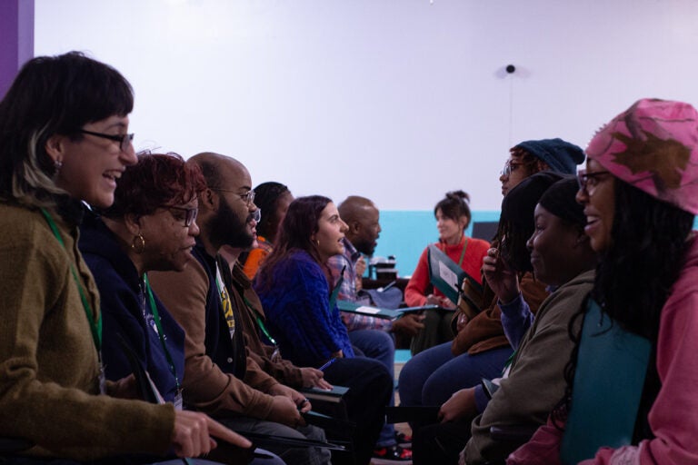 Workshop attendees talking face to face