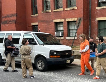 Maryland Zizians Deputies escort Michelle Zajko, left, Daniel Blank, right, and Jack LaSota, in orange, from the Allegany County Courthouse