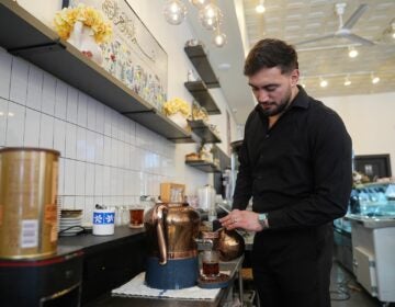Muhammed Emanet pours Turkish tea