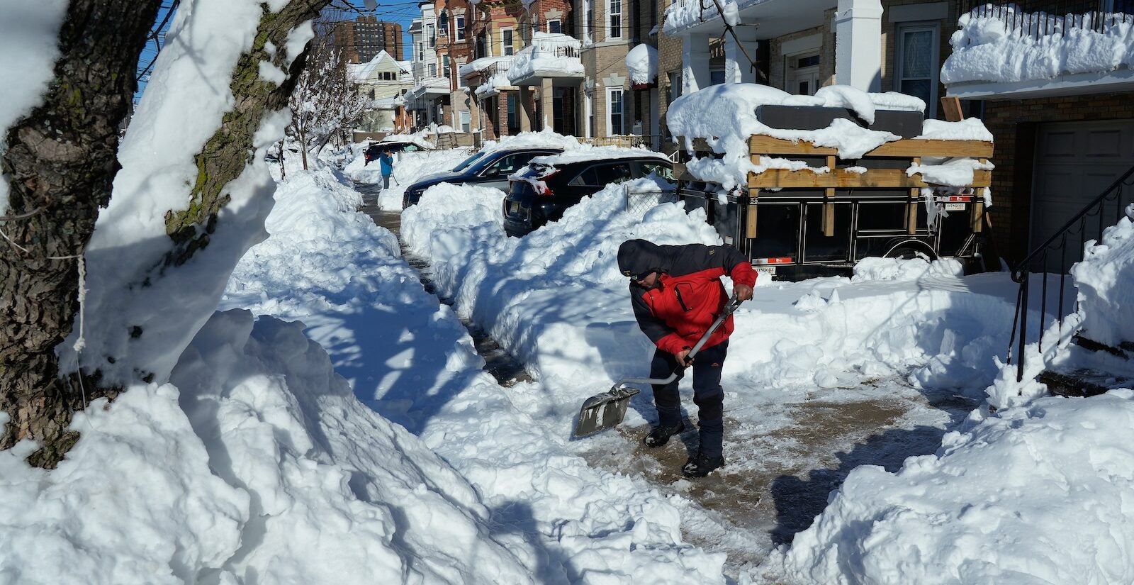 Luis Javier Rodriguez clears snow from a sidewalk, Tuesday, Feb. 24, 2026, in Weekhawken, N.J.