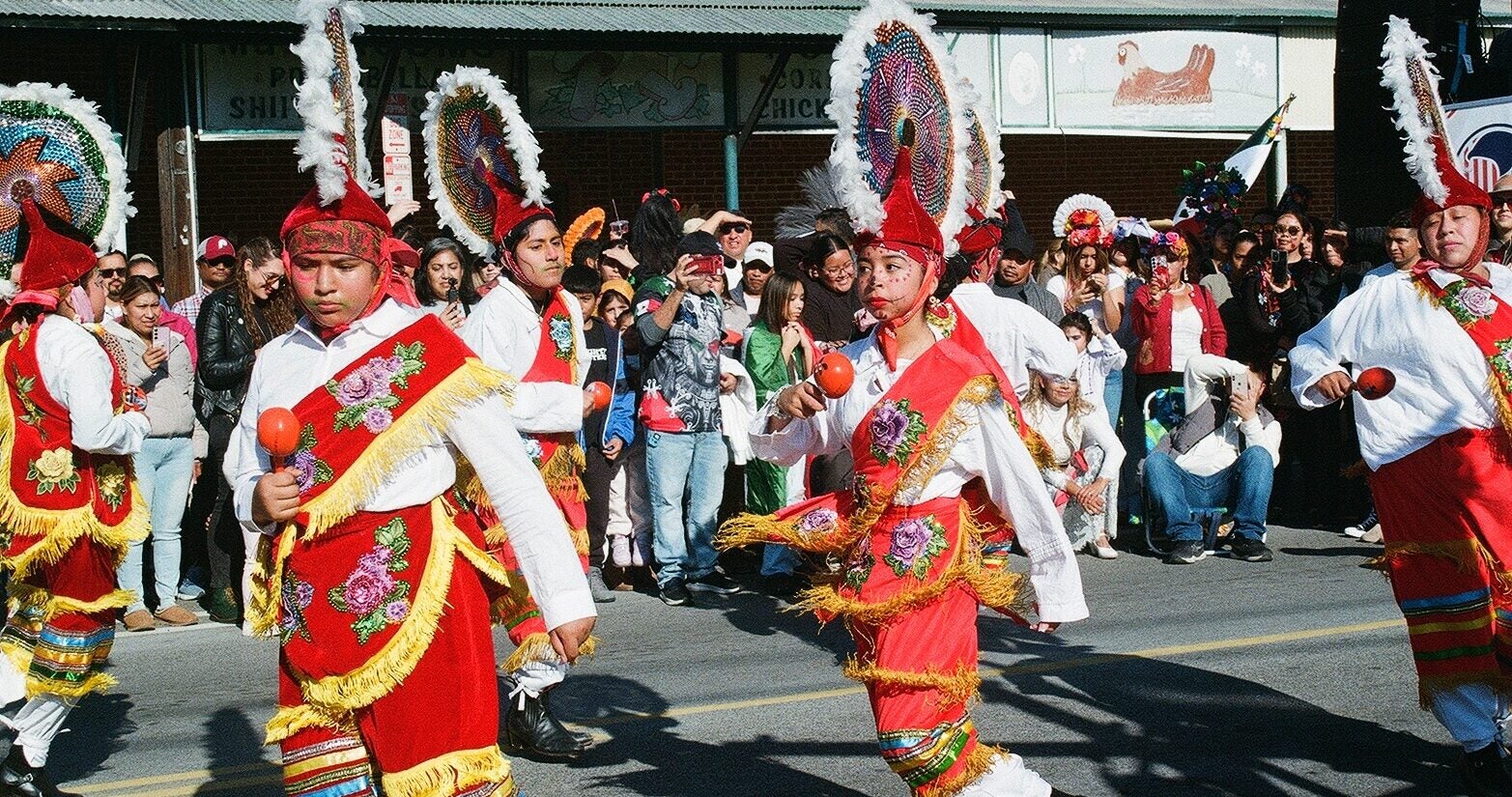 Ñuuxakun dancers performing in the street