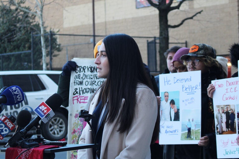 Victoria Peña-Parr speaking at a podium during the press conference