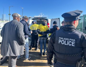 Philadelphia police arrested three activists