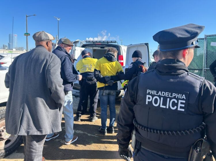 Philadelphia police arrested three activists