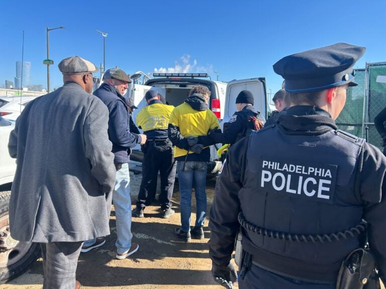 Philadelphia police arrested three activists