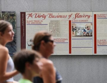 Slavery Exhibit Removed People walk past an informational panel at President's House Site Tuesday, Aug. 19, 2025, in Philadelphia.