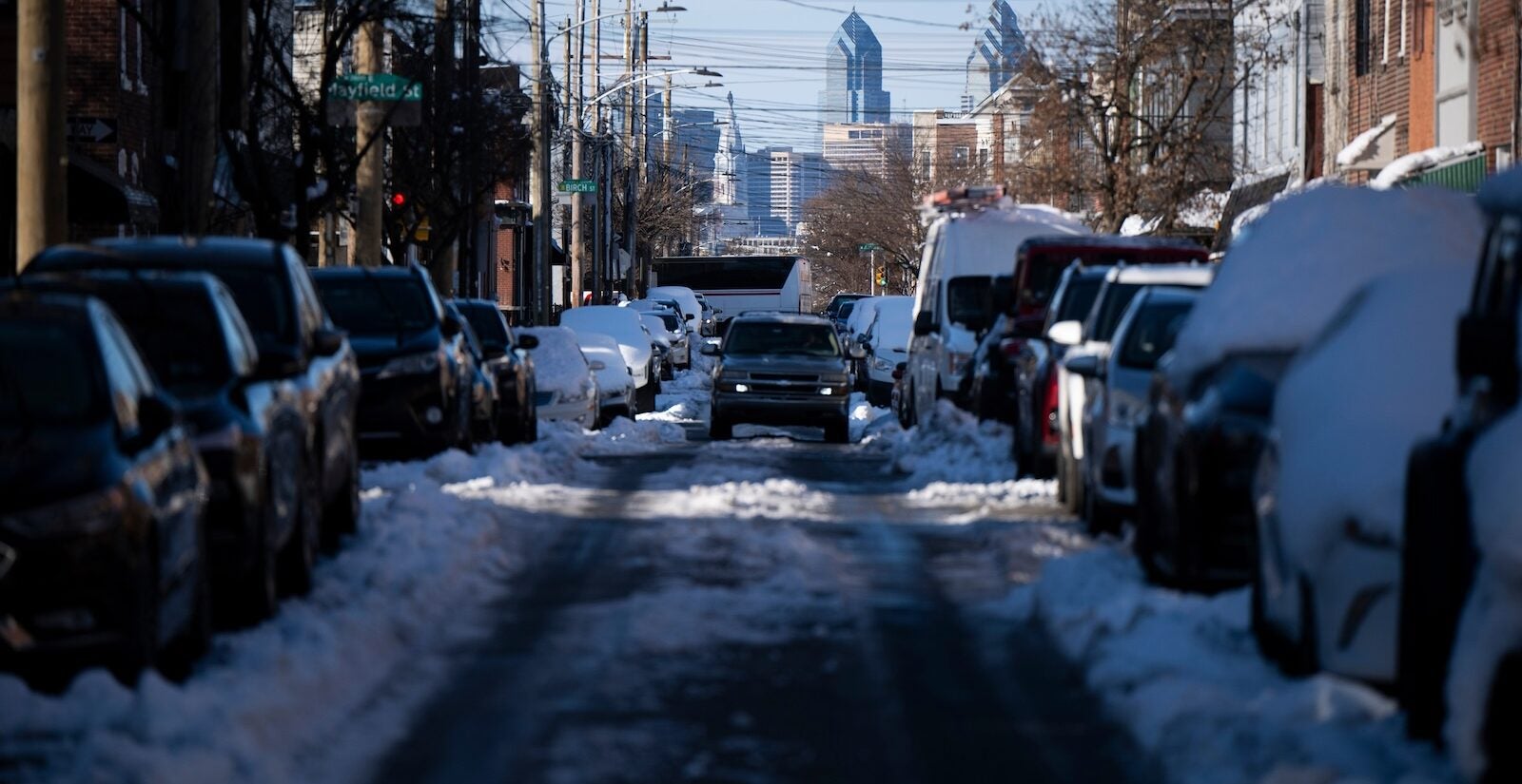 Snow stays piled up as temperatures remain below freezing on Tuesday, Feb. 24, 2026 in Philadelphia.