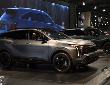 Vehicles on display at the Kia exhibit of the Philly Auto Show