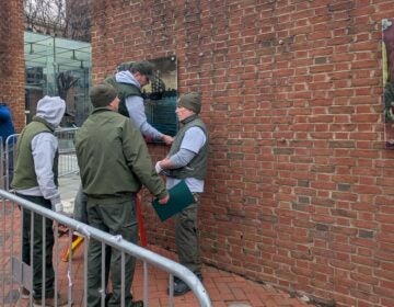 presidents-house-panels-restoration-n-kariuki-2026-02-19-3b Workers restore panels to the slavery exhibits at the President's House Site