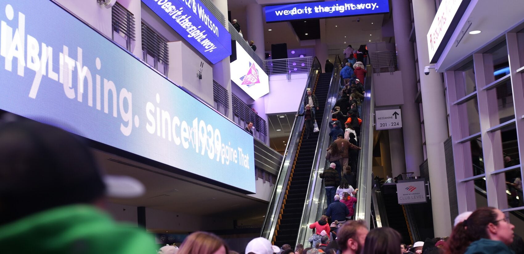 fans on the escalator at Xfinity Mobile Arena