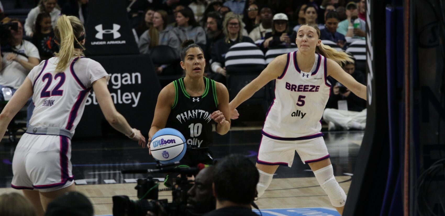 Kelsey Plum dribbling