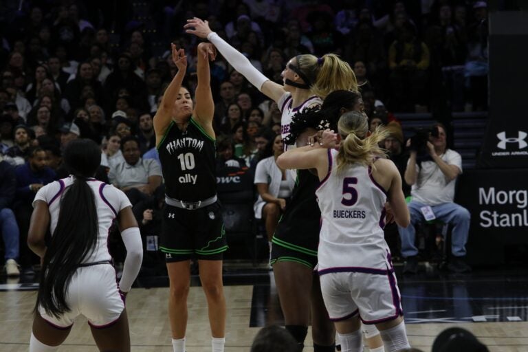 Kelsey Plum shooting a shot