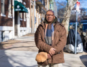 Carlos Boothe looks on