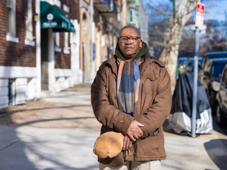 Carlos Boothe looks on