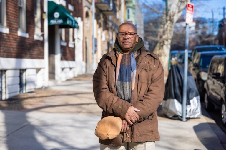 Carlos Boothe looks on